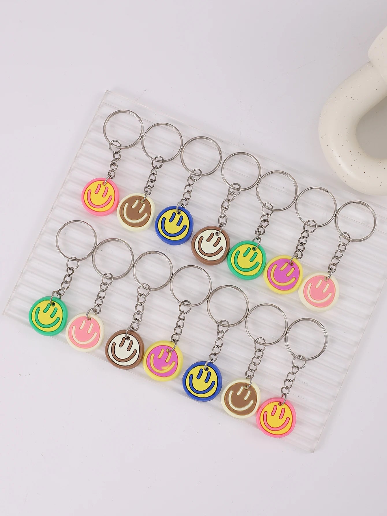 14pcs Cartoon Smile Face Keychain Set – Cute PVC Charms for Bags, Keys & Party Favors - Image 2